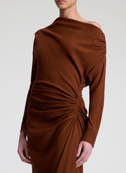 woman wearing brown dress