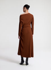 woman wearing brown dress