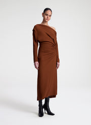 woman wearing brown dress