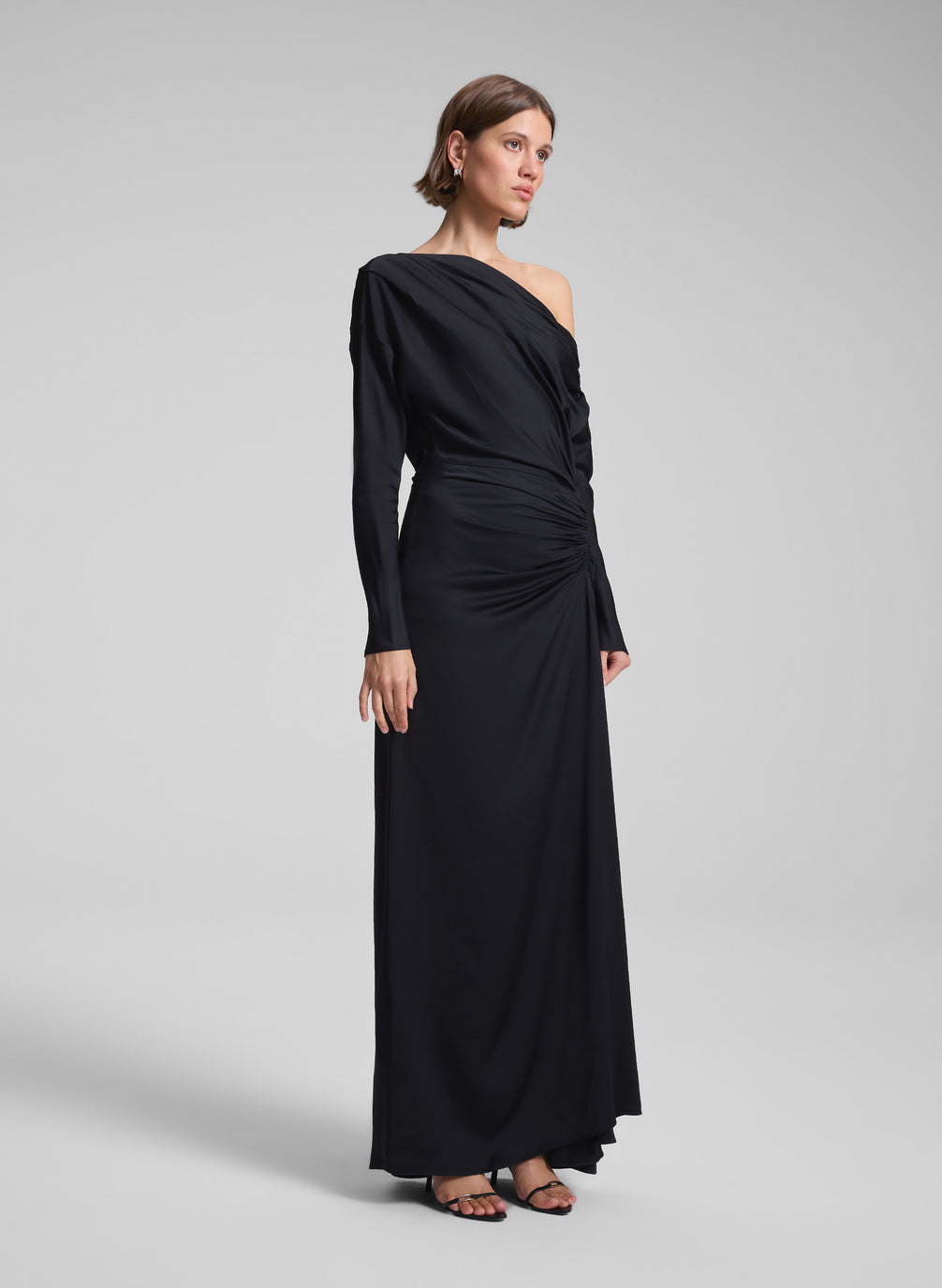 woman wearing black satin gown