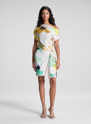 woman wearing floral mini dress