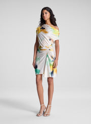 woman wearing floral mini dress