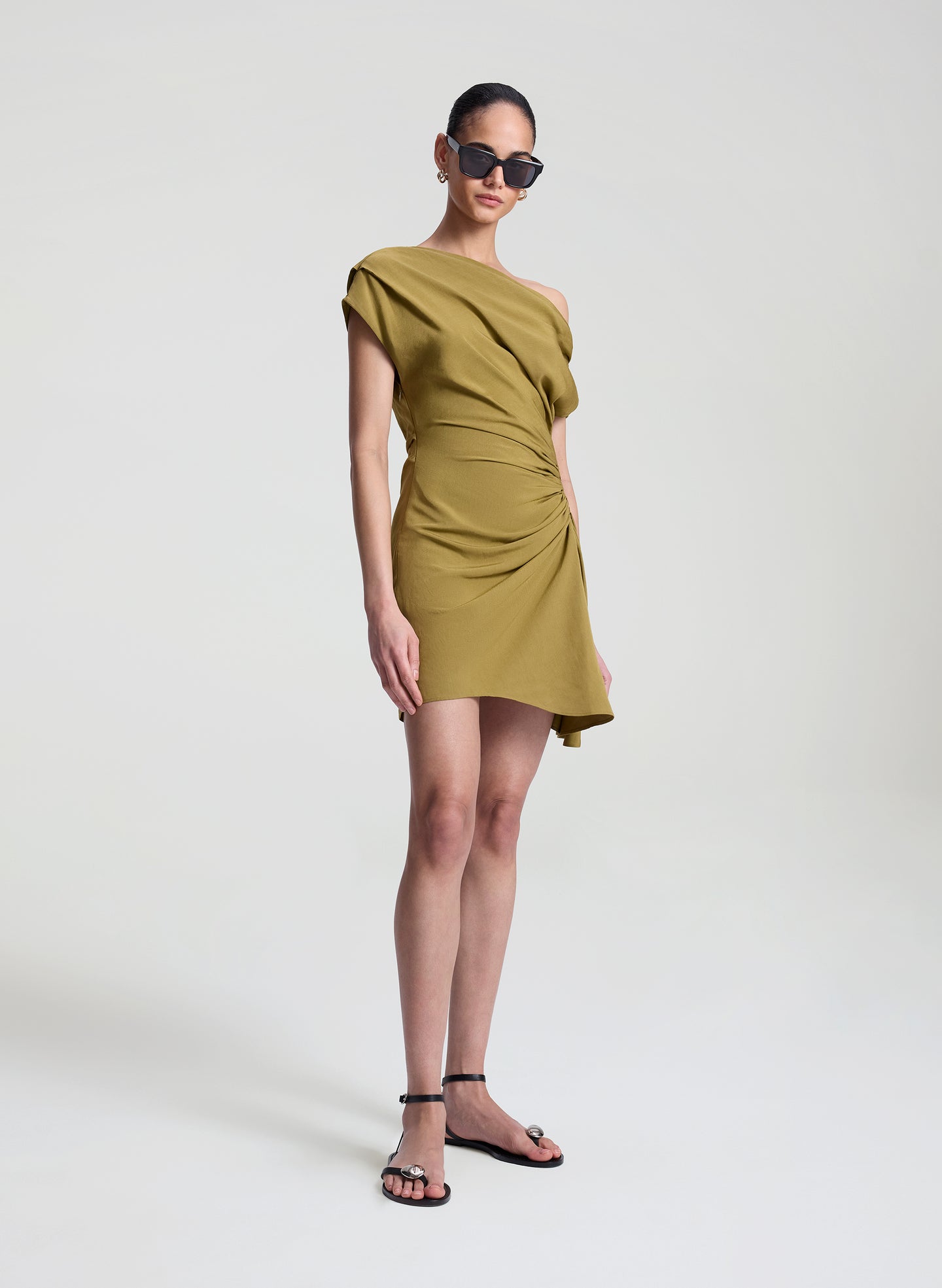 woman wearing olive dress linen mini dress