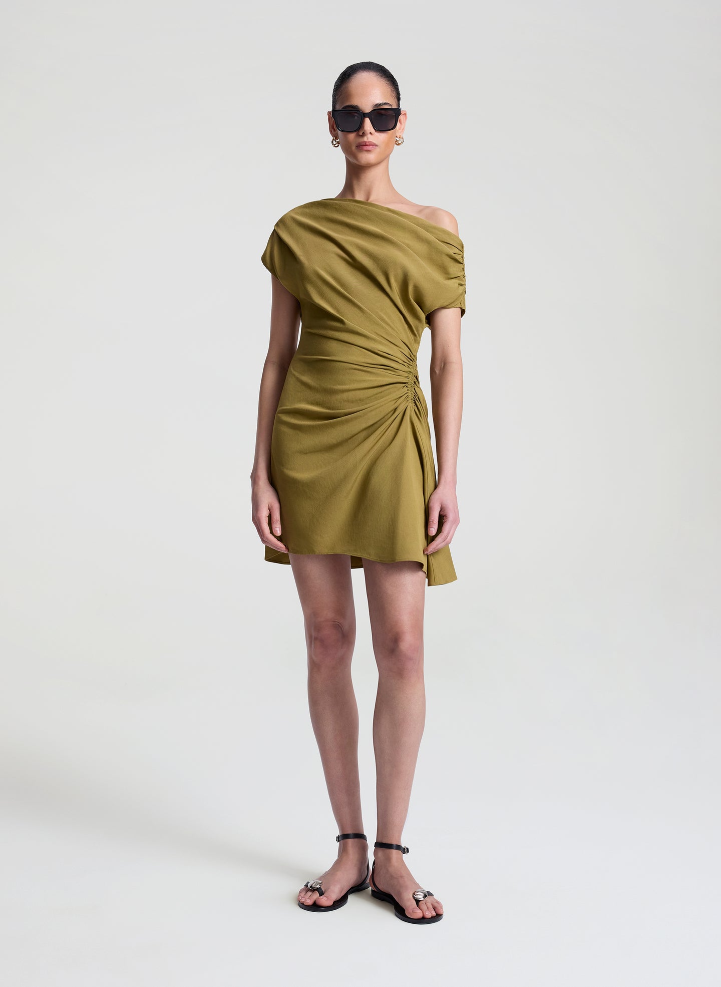 woman wearing olive dress linen mini dress
