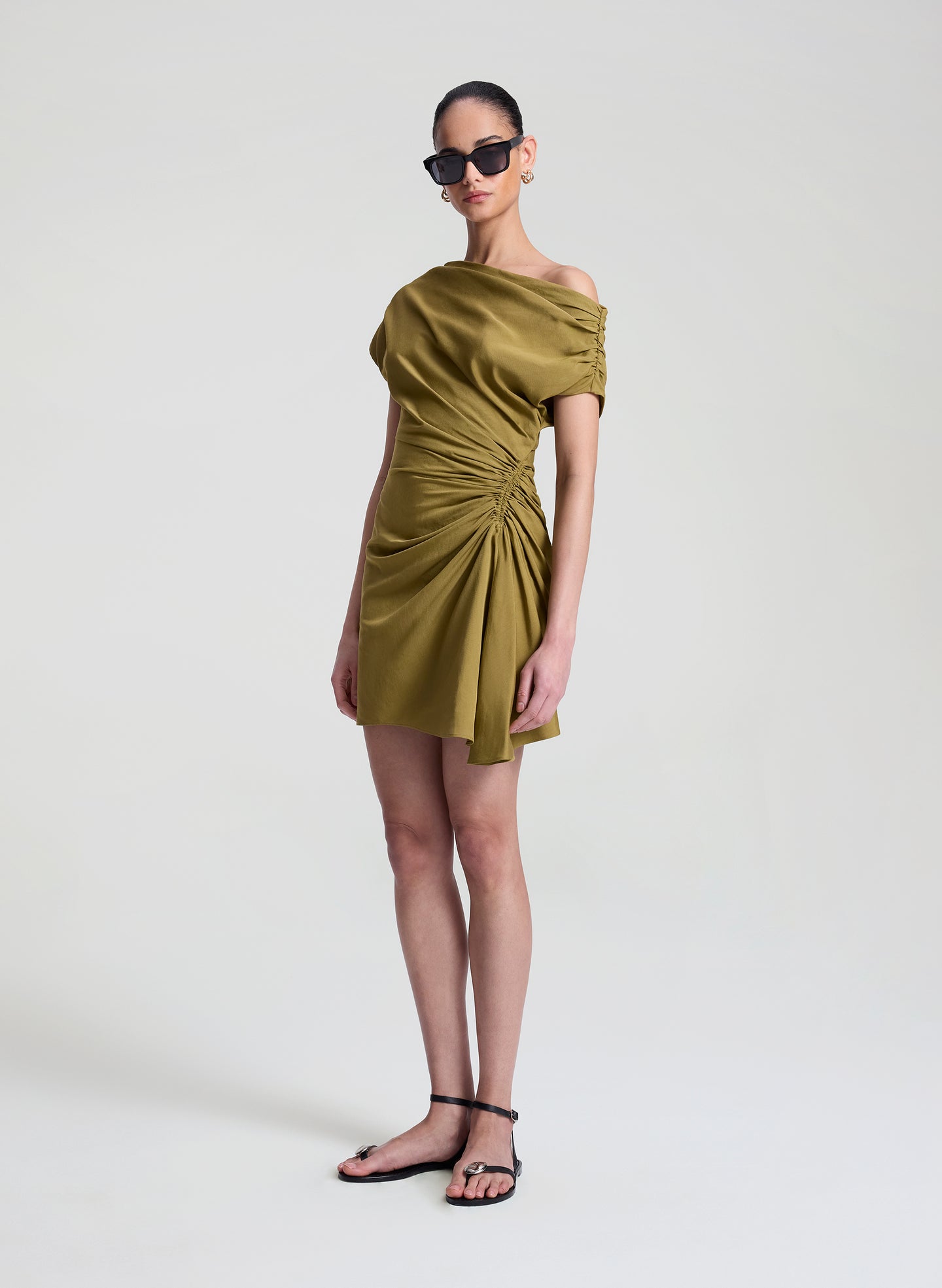 woman wearing olive dress linen mini dress