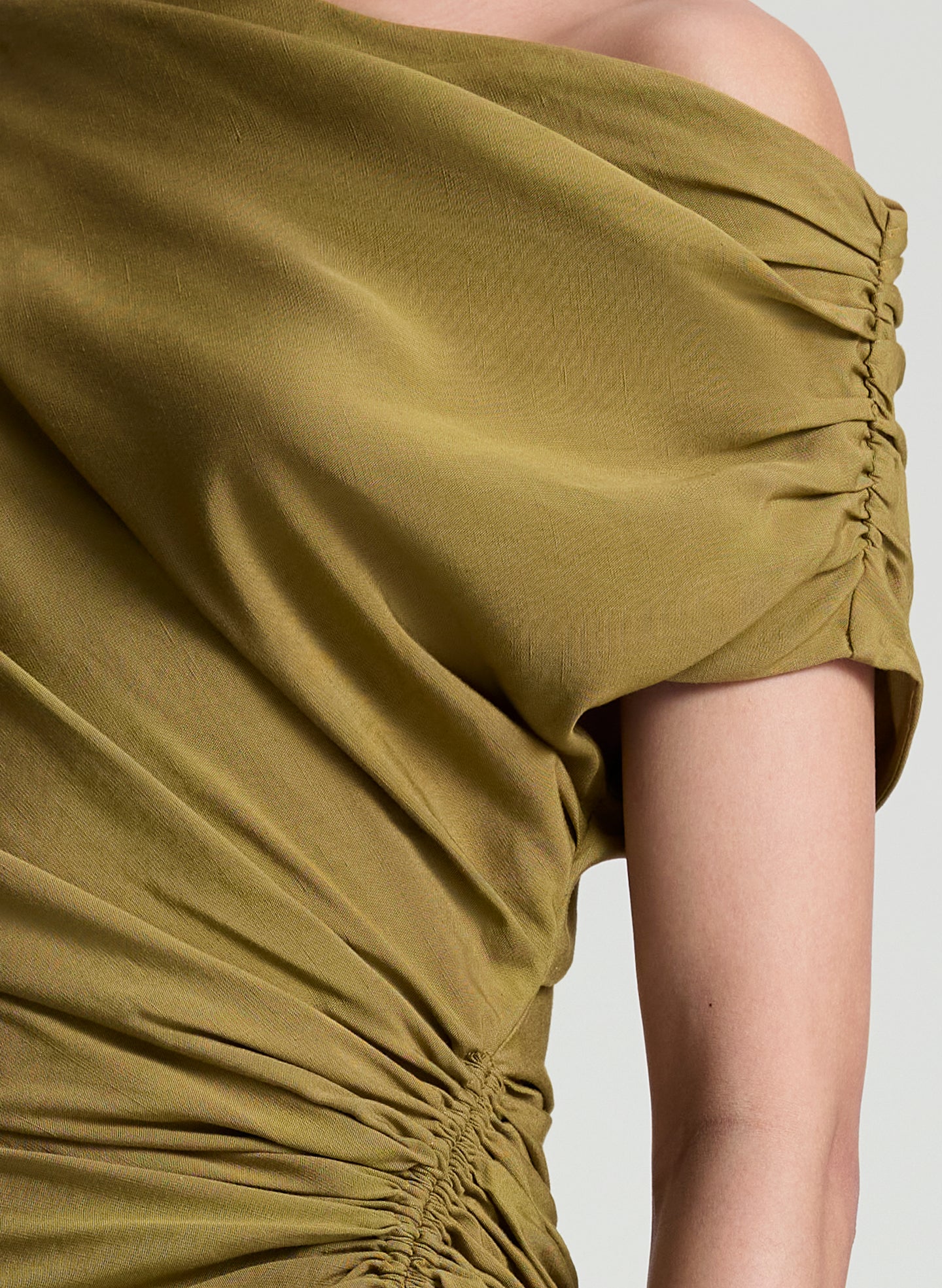 woman wearing olive dress linen mini dress