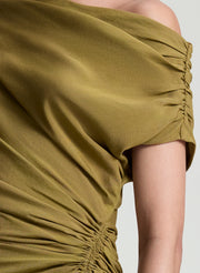 woman wearing olive dress linen mini dress