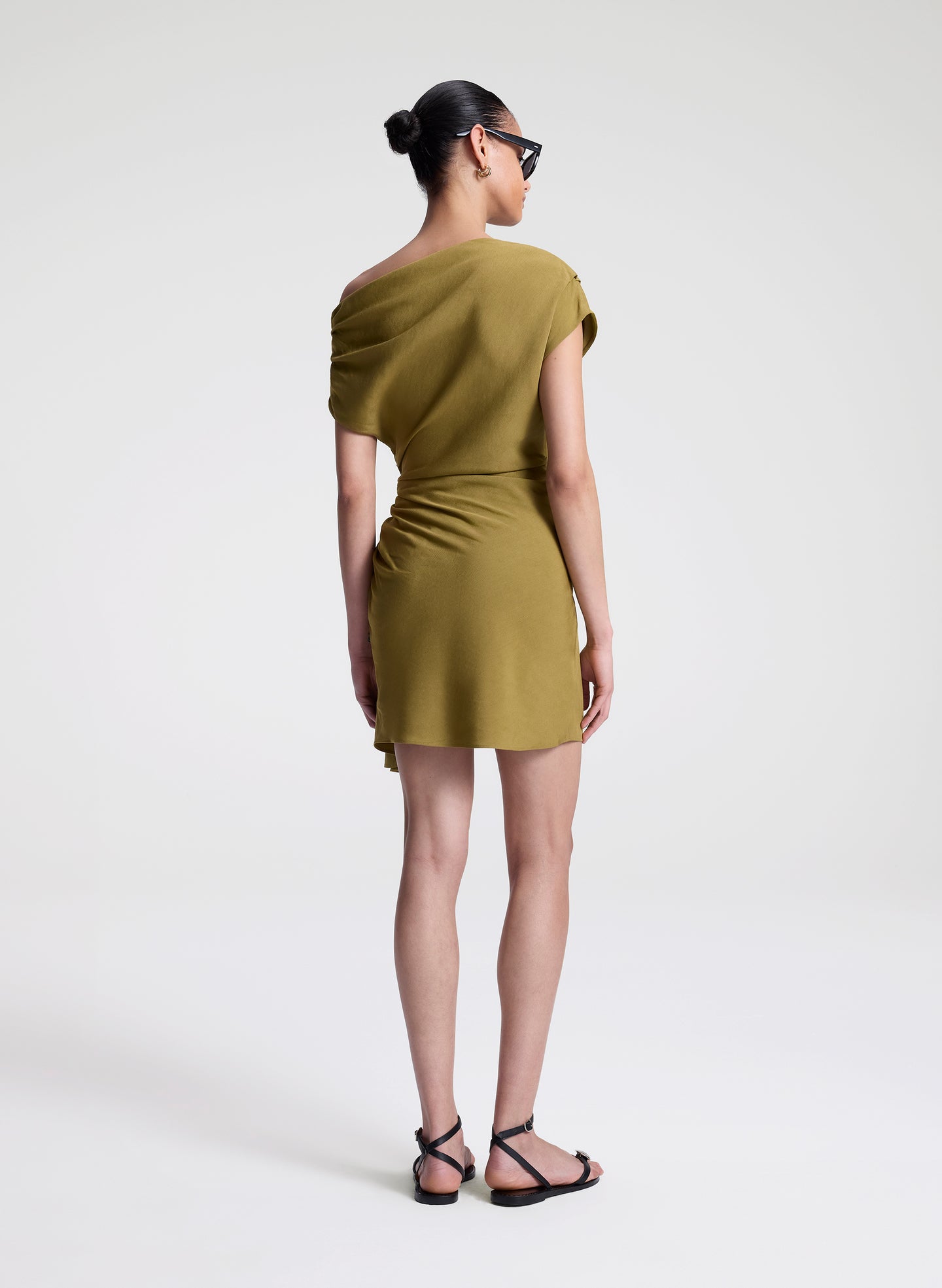 woman wearing olive dress linen mini dress