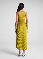 woman wearing pleated satin dress in yellow