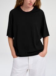 woman in black fine merino top