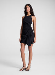 woman wearing black mini dress