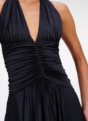 close up of navy blue pleated gown