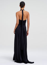 woman wearing navy blue satin gown
