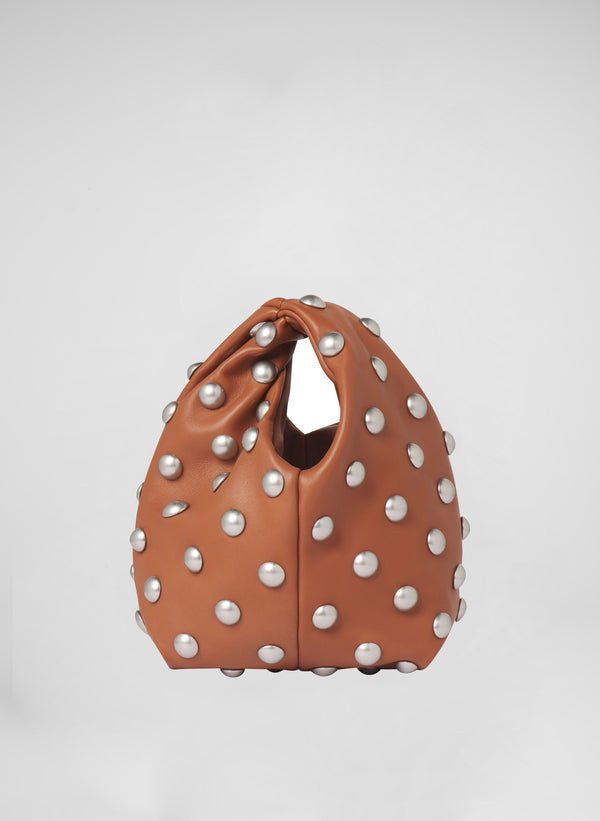 brown studded clutch bag