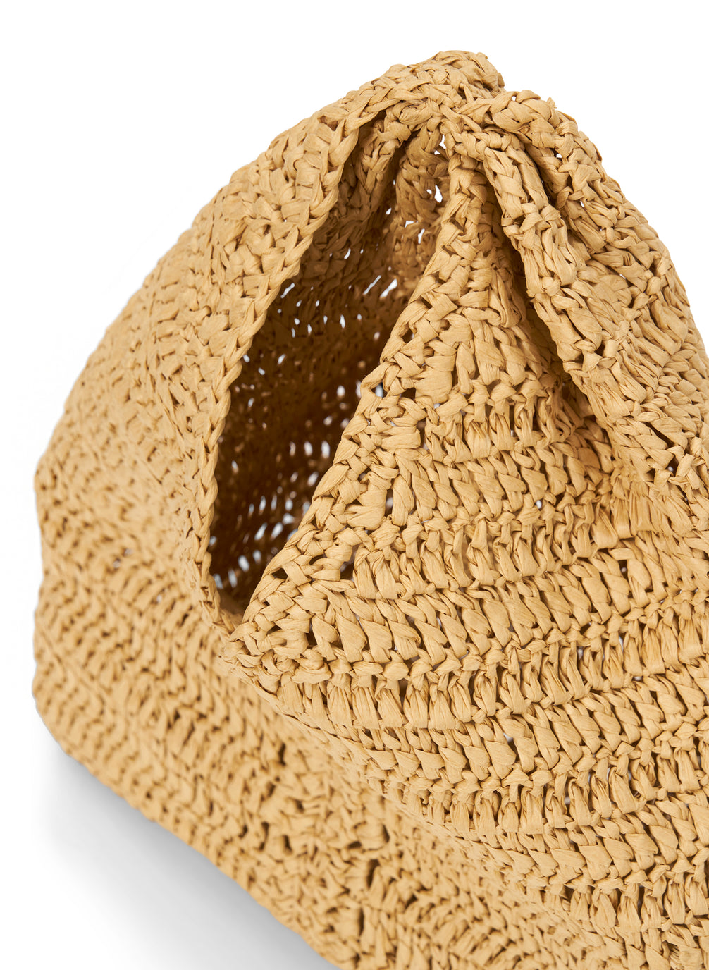 detail view of small raffia woven handbag