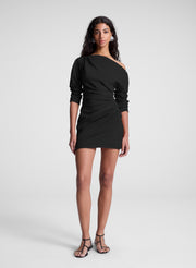 woman wearing black mini dress