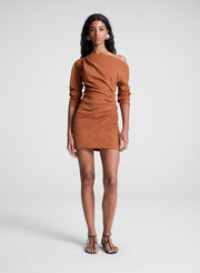 woman wearing orange off shoulder mini dress