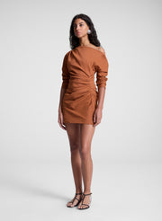 woman wearing orange off shoulder mini dress