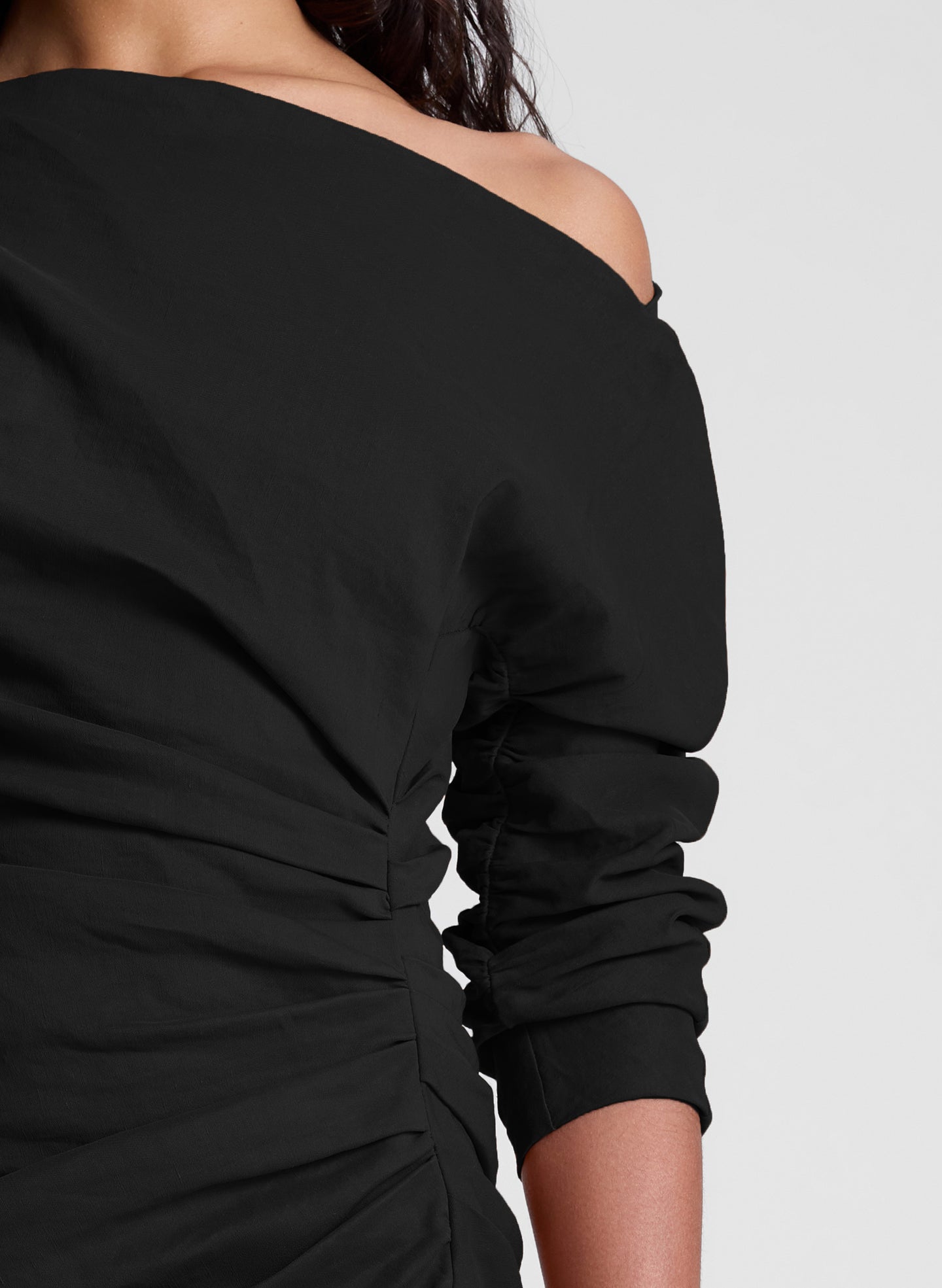 woman wearing black mini dress