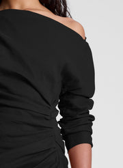 woman wearing black mini dress