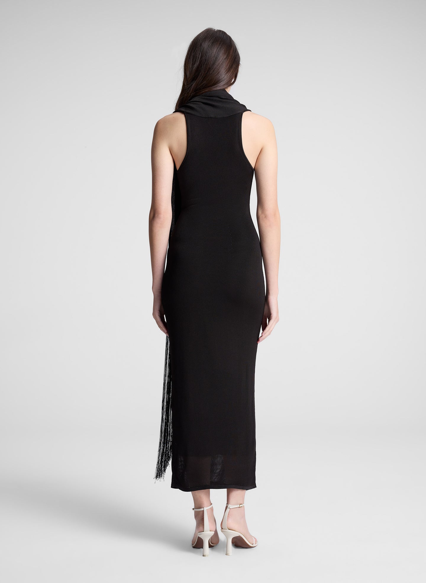 woman wearing dark brown maxi dress