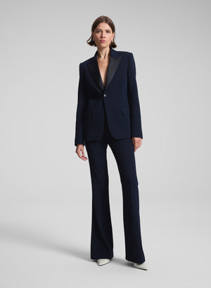 woman wearing dark blue suit