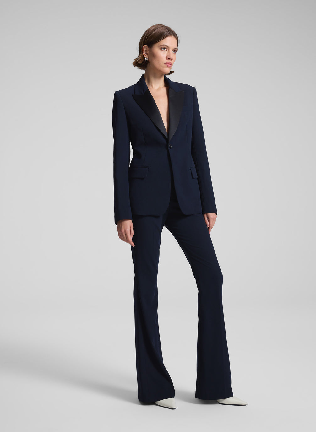 woman wearing dark blue suit