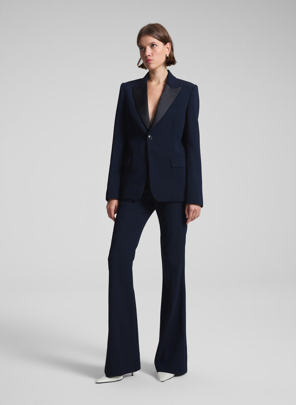 woman wearing dark blue suit