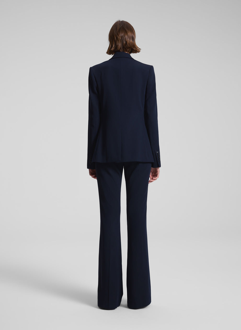 woman wearing dark blue suit