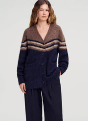 woman wearing brown and navy cardigan