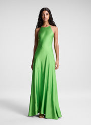 woman wearing green maxi dress