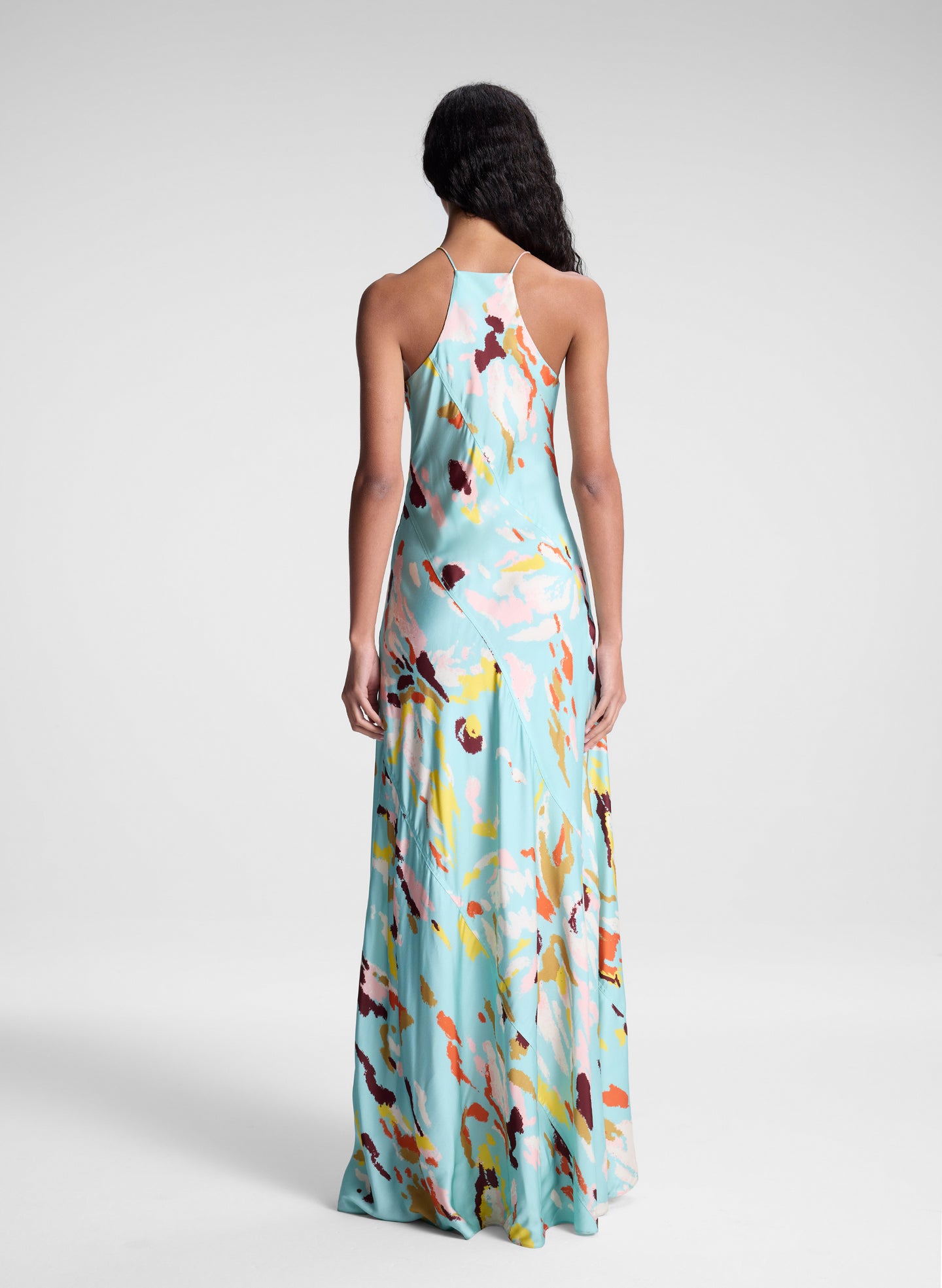 woman wearing multicolor maxi dress