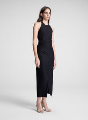 woman wearing black midi halter dress