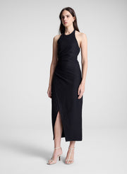 woman wearing black midi halter dress