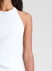 woman wearing white midi halter dress