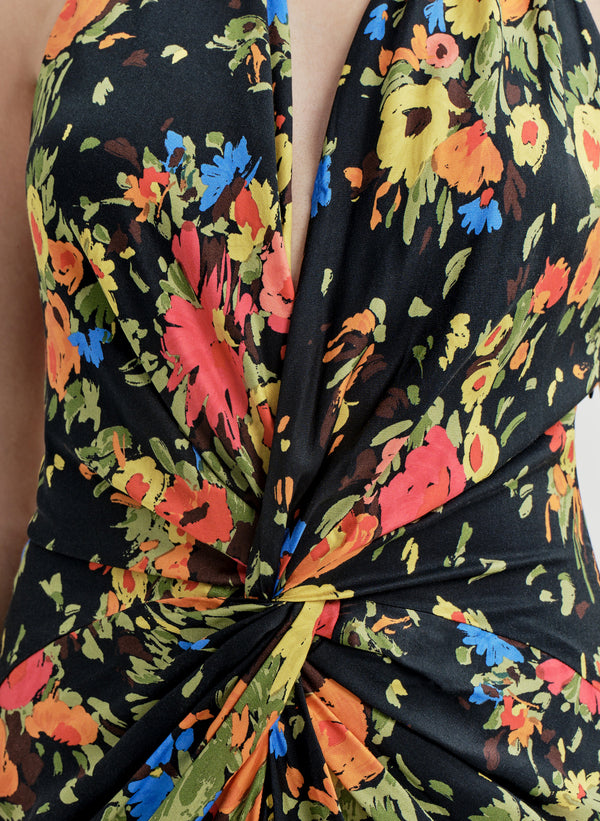 Close-up of a floral gown with a black background
