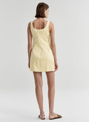 woman wearing mini dress in yellow