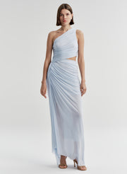 Woman wearing a light blue one-shoulder dress on a white background