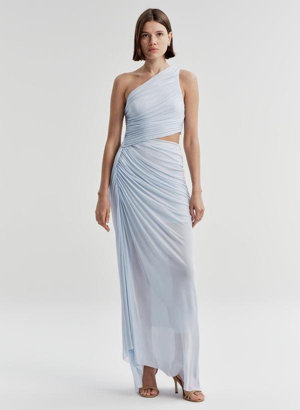Woman wearing a light blue one-shoulder dress on a white background
