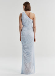 Woman wearing a light blue one-shoulder dress on a white background