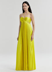 Woman wearing a yellow dress on a white background
