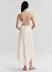 woman wearing white satin midi dress