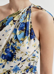 Floral top with blue and green pattern on a white background
