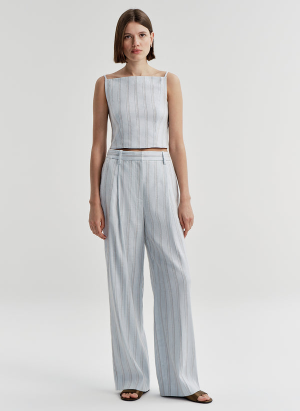 woman wearing blue striped linen set