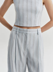 woman wearing blue striped pants