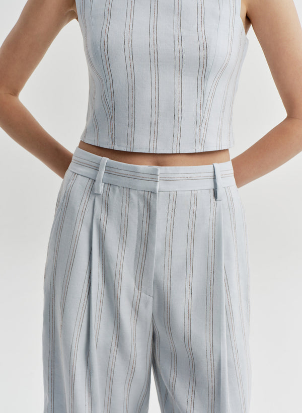 woman wearing blue striped pants