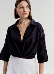woman in navy blue shirt