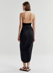 woman wearing black bodysuit and navy blue midi skirt