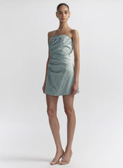 woman wearing light blue strapless mini dress