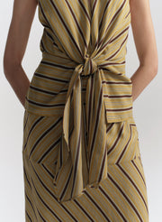 Striped top with a knot detail on a white background